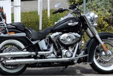 If you are on a business trip and rent a car to visit your company’s branches or customers, why would you always choose a boring middle of the road kind of car? Depending on the climate on your destination, a convertible would add a nice touch to your trip or… why not rent a Harley-Davidson?